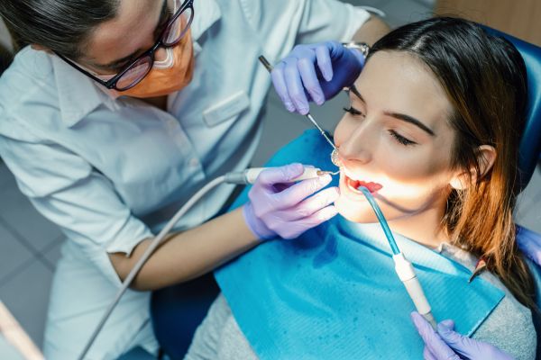 Dental Sedation Newport - Woman receiving dental treatment